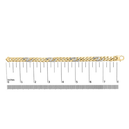 Yellow metal bracelet with alternating links, some encrusted with white round gemstones in shared prong settings, displayed flat on a ruler for size reference.