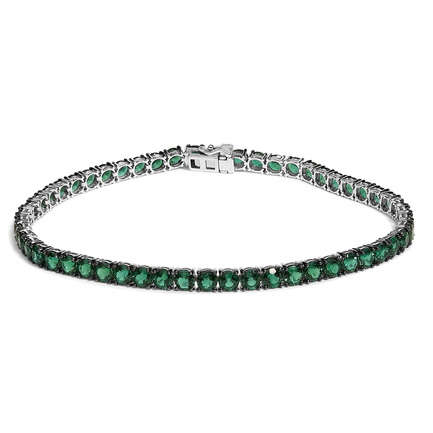 White bracelet with round green gemstones in a 4-prong setting, shown from a front angle on a white background.
