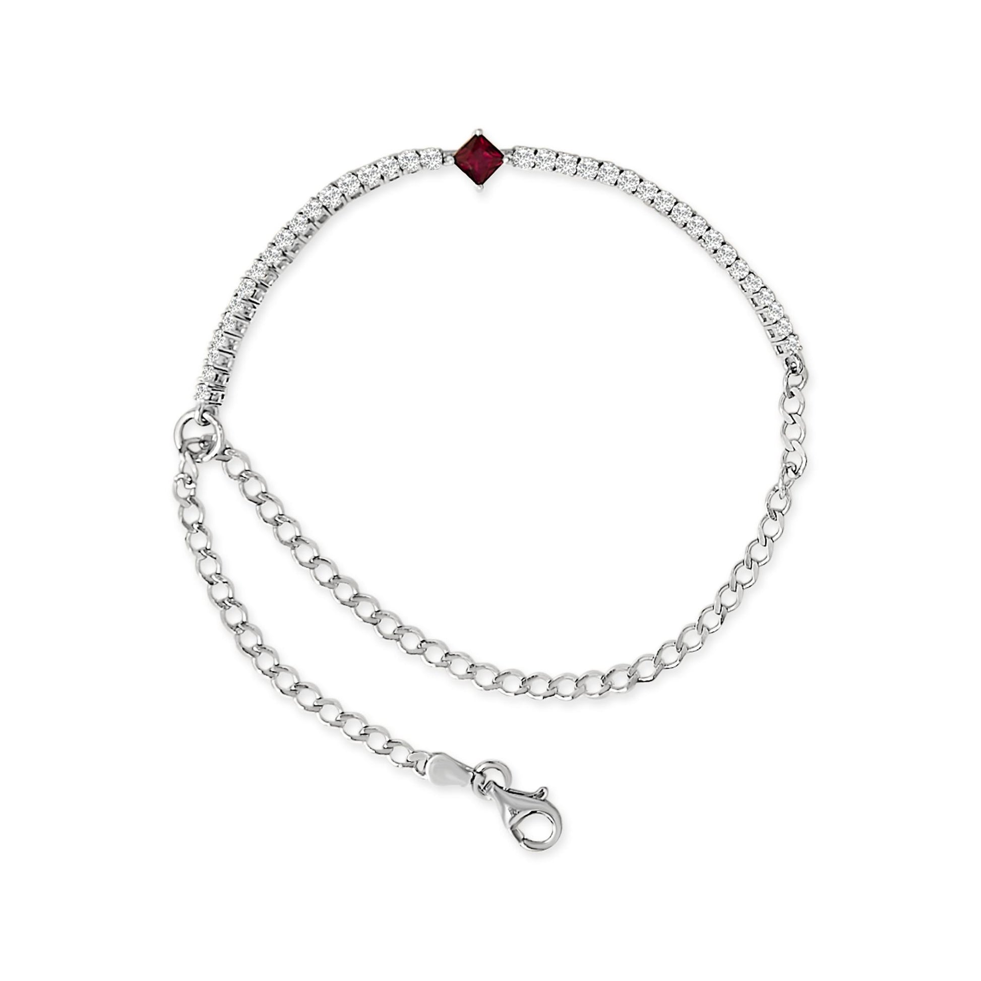 Top-down view of a white bracelet with a chain and clasp, featuring round white gemstones in 4-prong settings along part of the band and a single red princess-shaped gemstone in a 4-prong setting at the center.