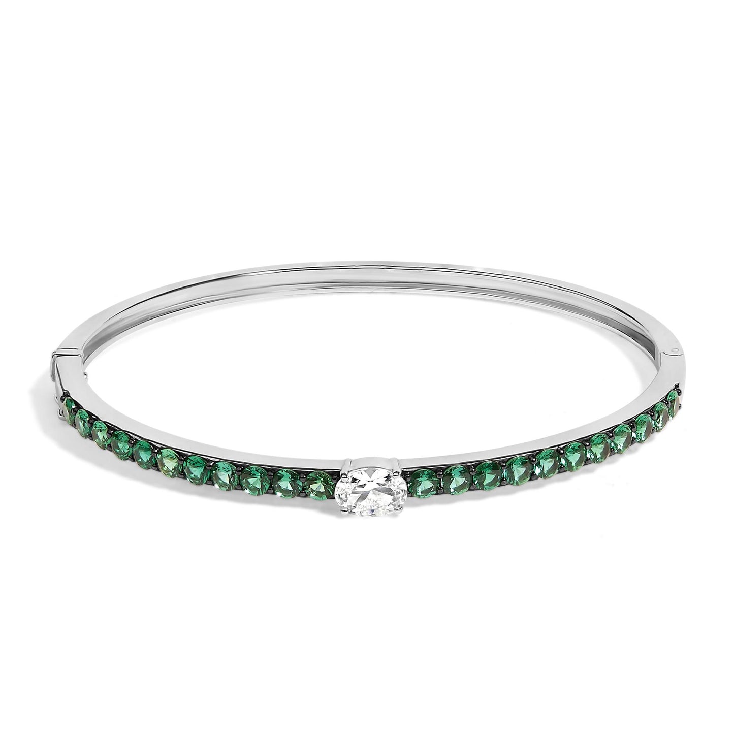 Bracelet with a white metal band, featuring a row of round green gemstones along the front and a single oval white gemstone center-set, shown from a front angle.