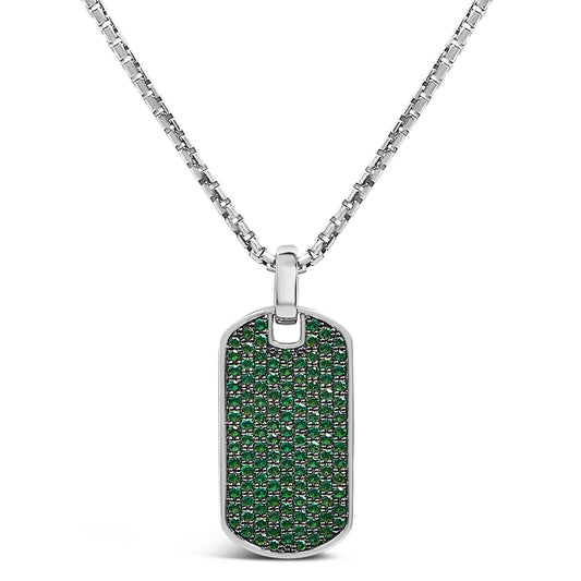 Front-facing view of a white necklace with a rectangular pendant featuring multiple round green gemstones in a shared prong setting.