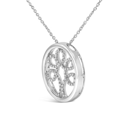 Close-up side angle of a white metal round pendant necklace with an openwork floral design adorned with small white gemstones in 4-prong settings.