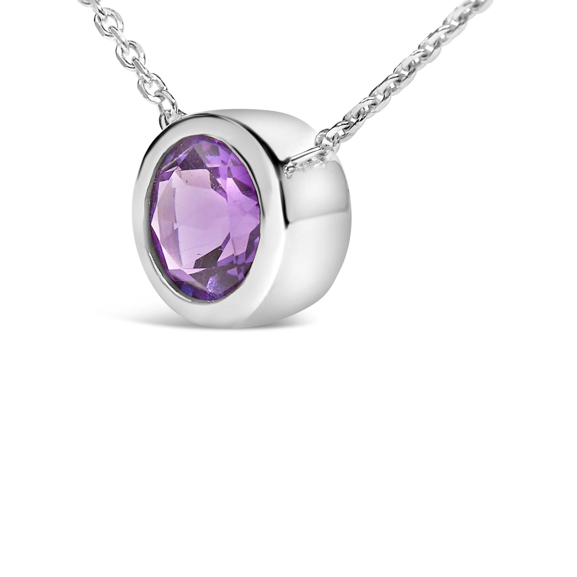 Close-up front angle of white necklace with a round purple gemstone in bezel setting.