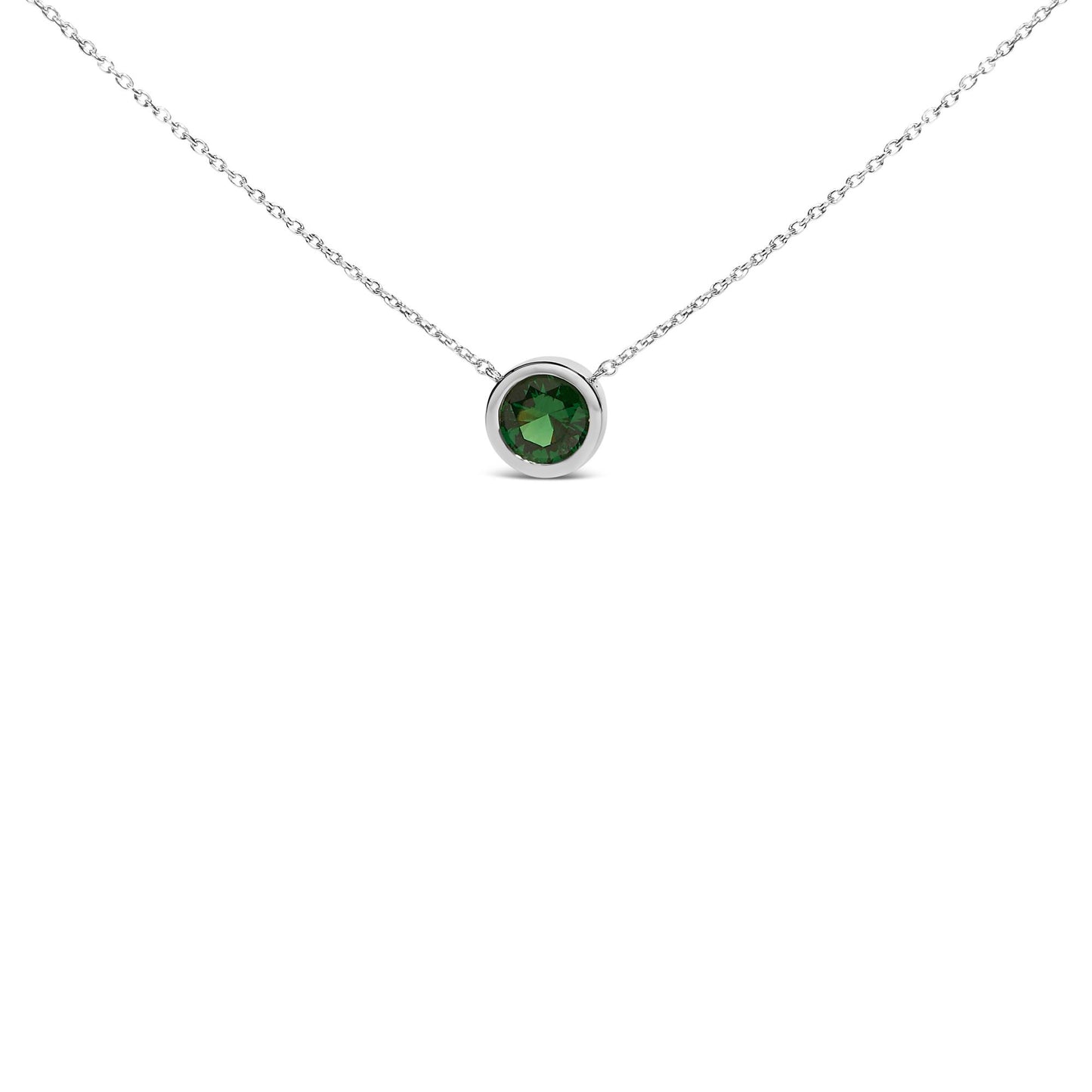 Close-up front view of a white necklace with a single round green gemstone in a bezel setting.