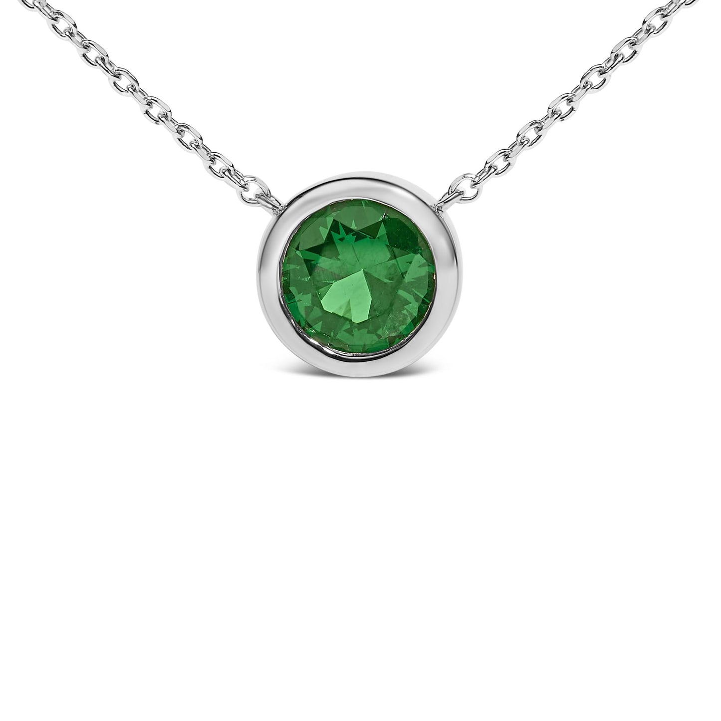 Close-up front view of a white necklace featuring a round green gemstone in a bezel setting.