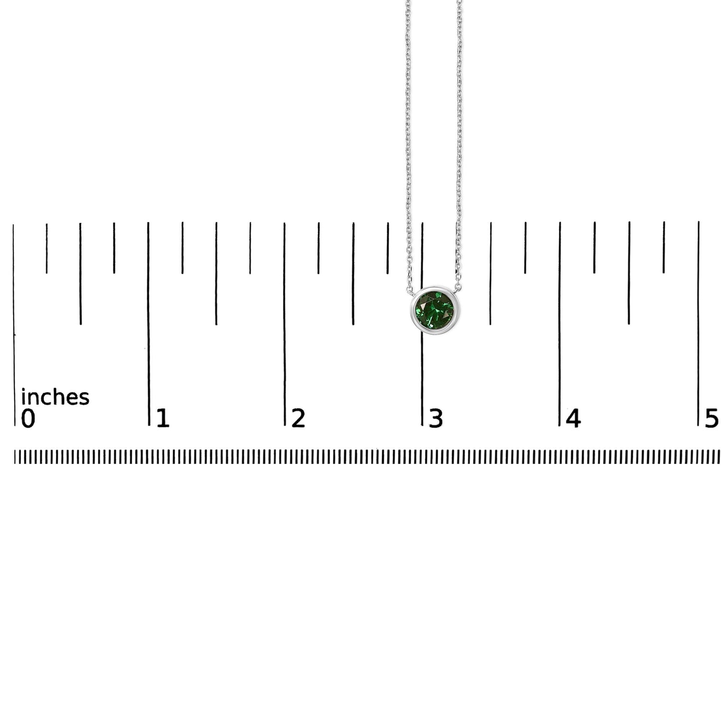 White necklace with a round green gemstone in bezel setting, shown hanging on a ruler for scale, front view.
