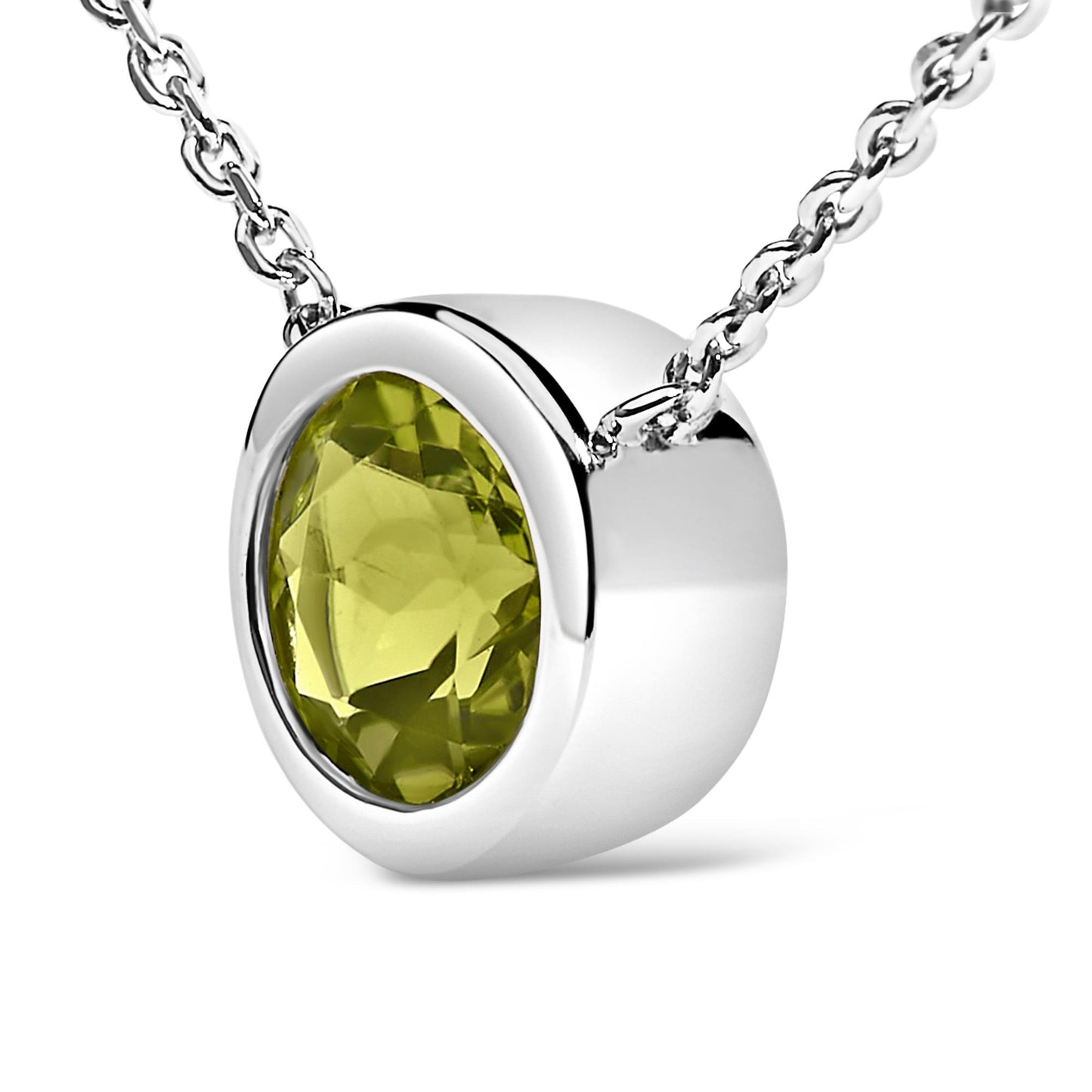 Close-up front angle of a white necklace with a round green gemstone in a bezel setting.