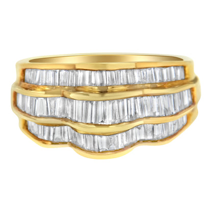 Close-up front view of a yellow metal ring with three rows of channel-set white baguette-shaped gemstones.