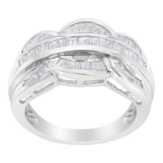 Front angled close-up of a white metal ring featuring multiple rows of channel-set white baguette-shaped gemstones.