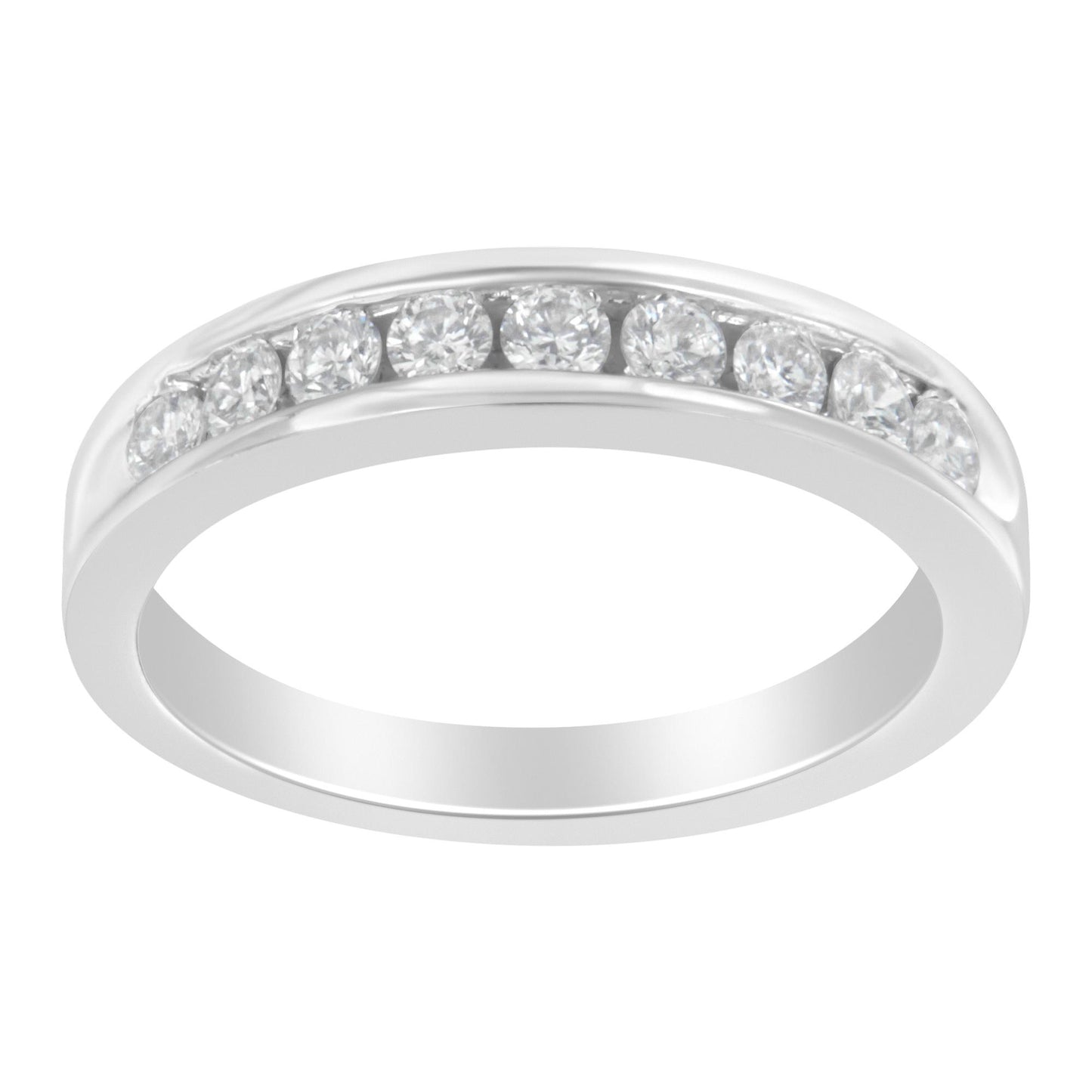 White metal ring with round white gemstones set in a channel, shown at a slight angle.