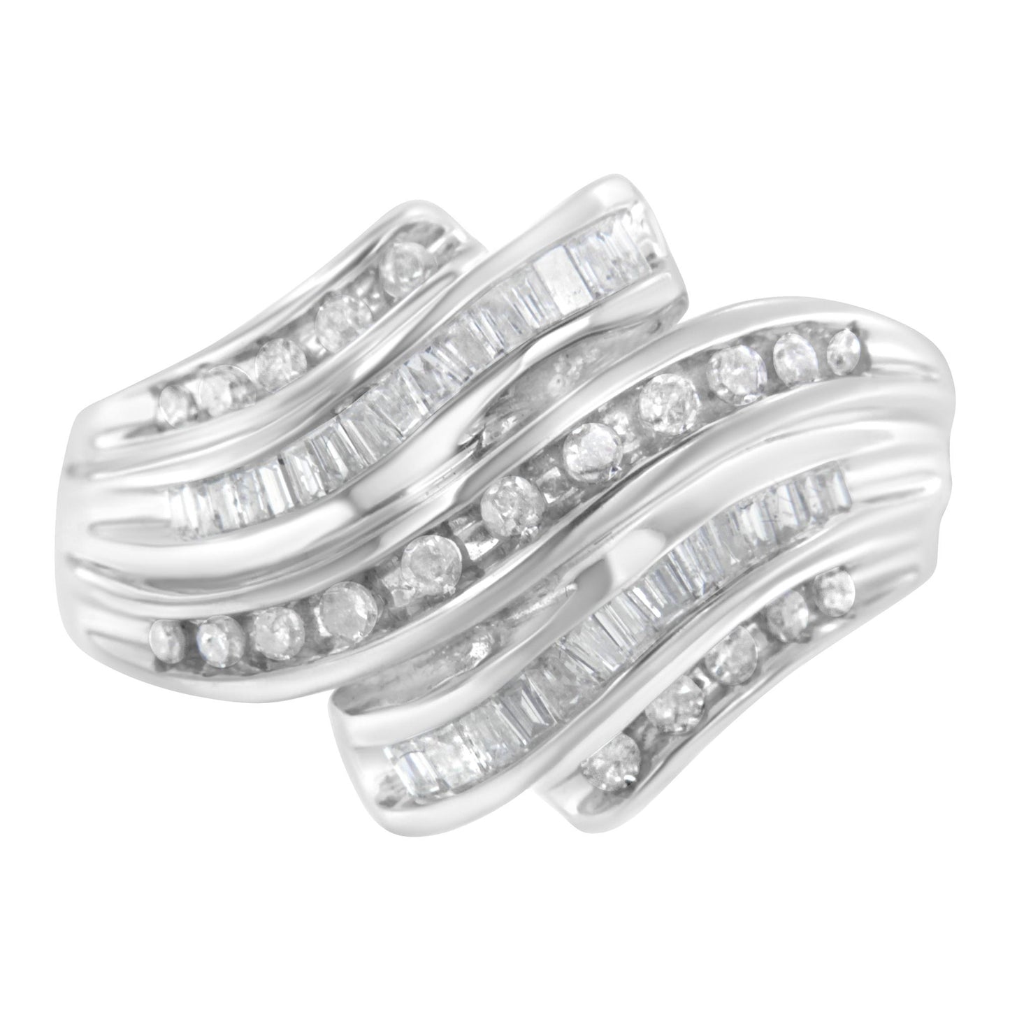 White metal ring shown from a top angle featuring alternating rows of round and baguette white gemstones in a channel setting.