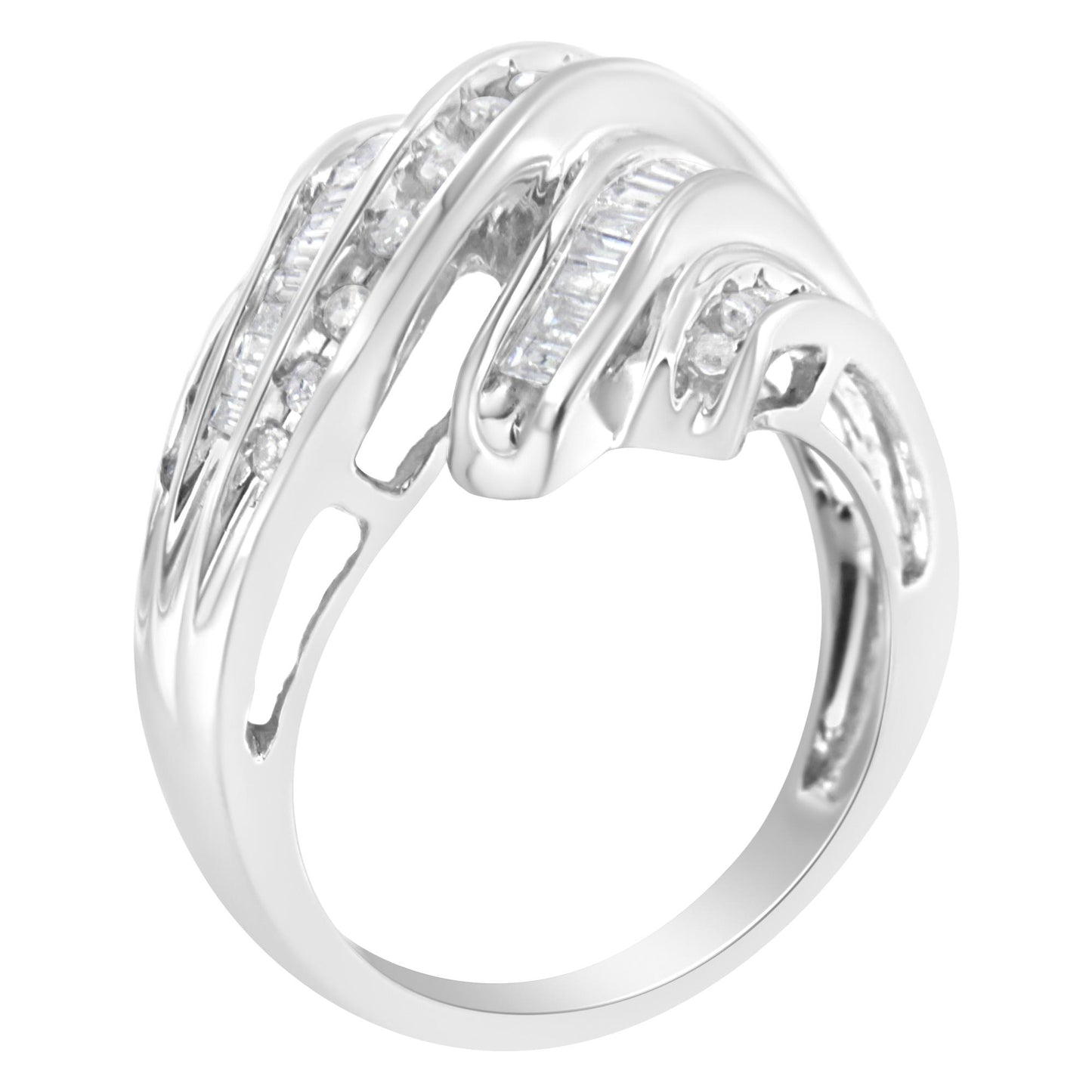 White metal ring with channel-set round and baguette white gemstones, shown at an angled side view.