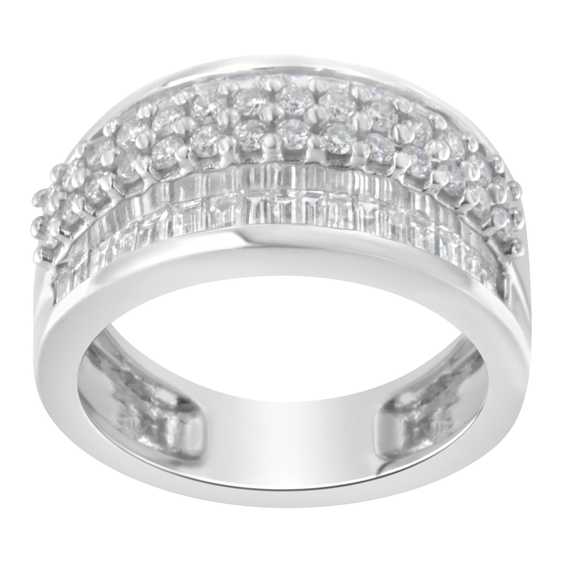 White metal ring with rows of round prong-set white gemstones above a band of baguette channel-set white gemstones, shown from a front angled view.