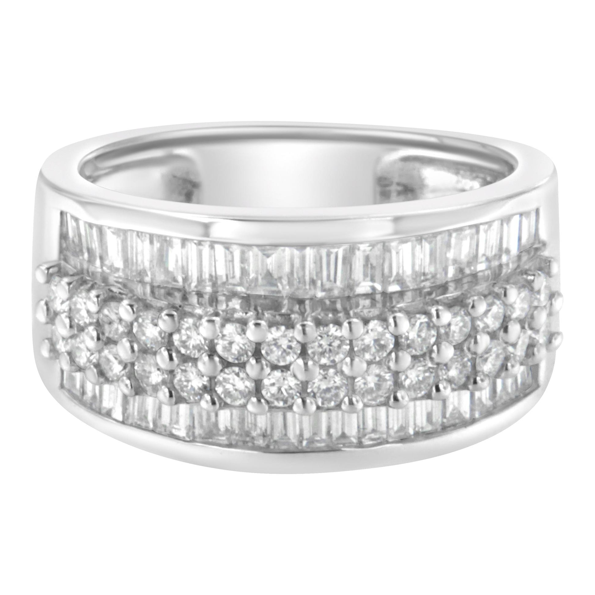 Front angled view of a white metal ring featuring a central row of round white gemstones in prong settings, flanked by rows of baguette white gemstones in channel settings.