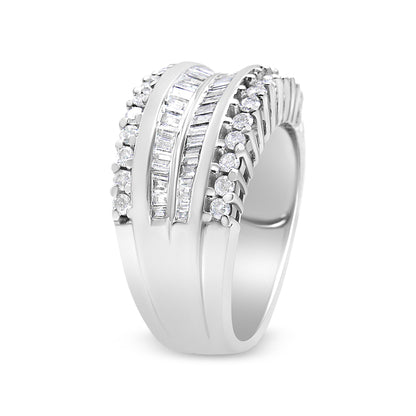 White metal ring with rows of round prong-set white gemstones flanking two rows of baguette channel-set white gemstones, shown at a three-quarter angle.
