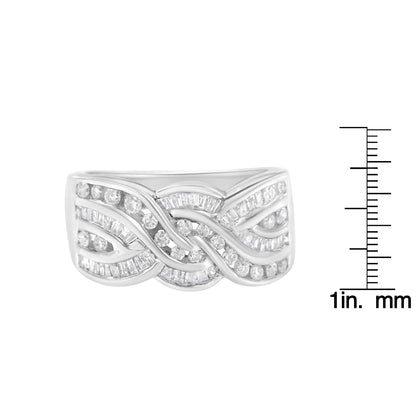 Front view of a white metal ring with an intricate wave pattern featuring round and baguette shape white gemstones in channel settings, shown next to a ruler for size reference.