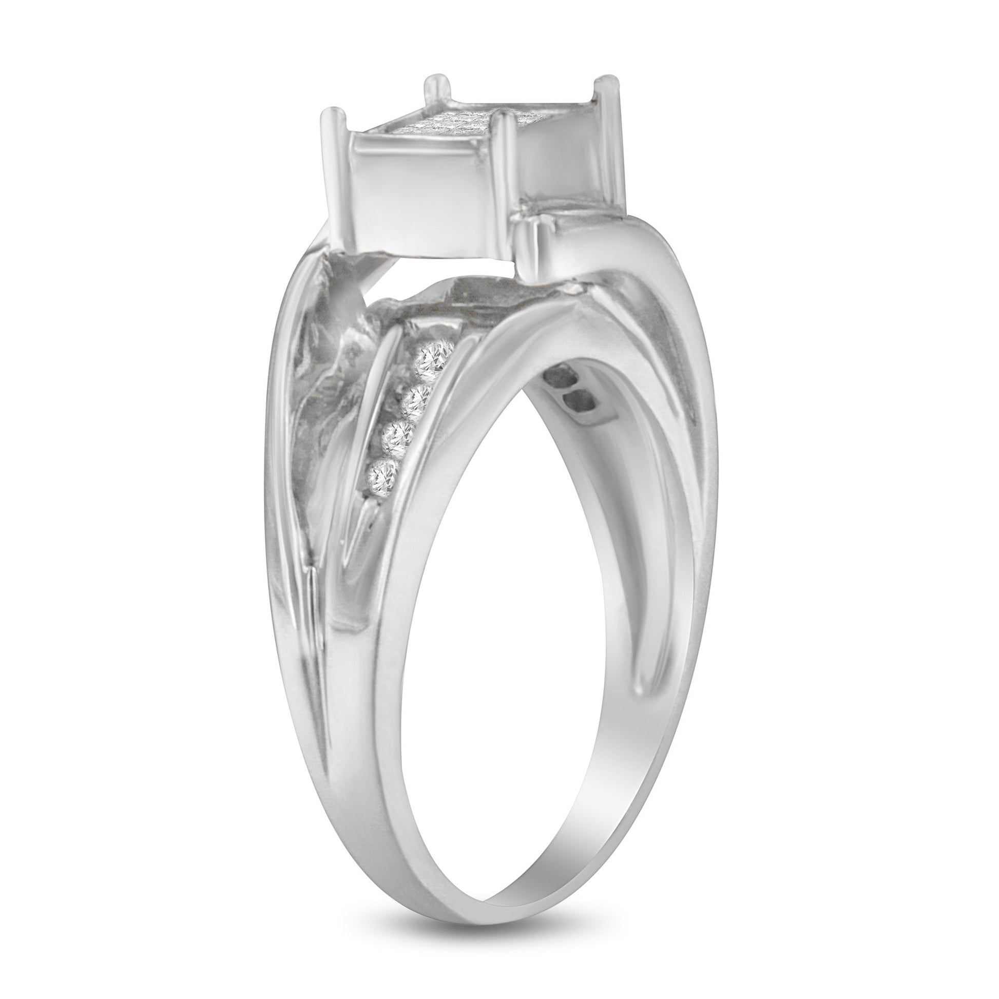 White metal ring with a large square gemstone in prong setting and smaller round gemstones set in a channel along the band, shown from a side angle.