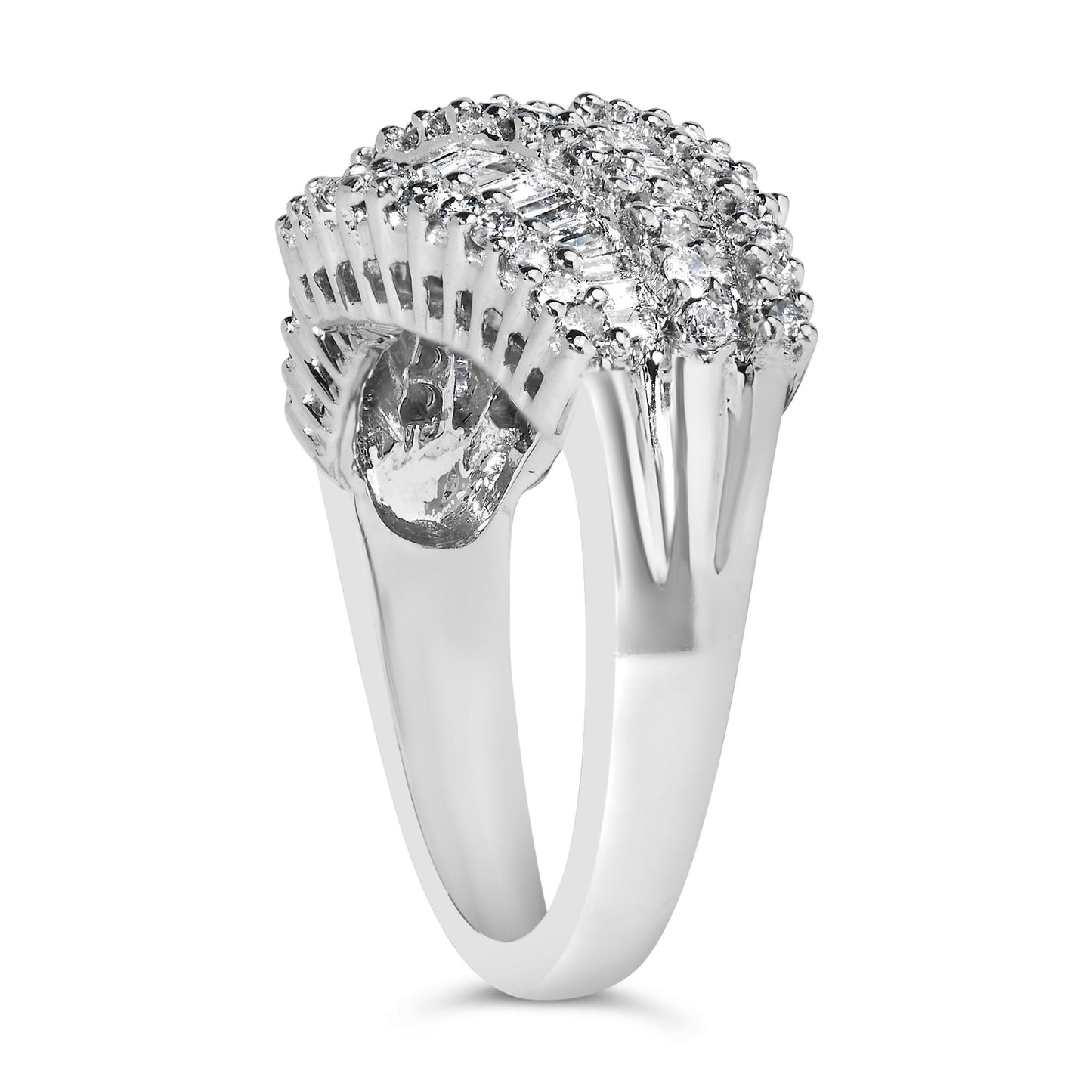 White metal ring with a curved design featuring two rows of round white gemstones in prong settings flanking a central row of baguette white gemstones in a channel setting, shown from a side angle.