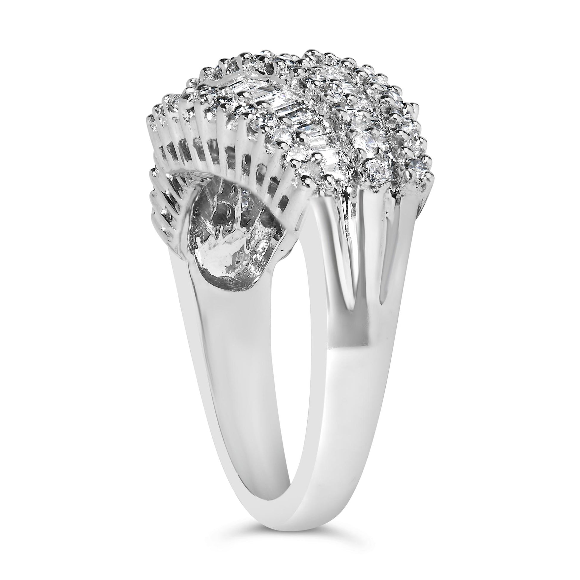 White metal ring with a curved design featuring two rows of round white gemstones in prong settings flanking a central row of baguette white gemstones in a channel setting, shown from a side angle.