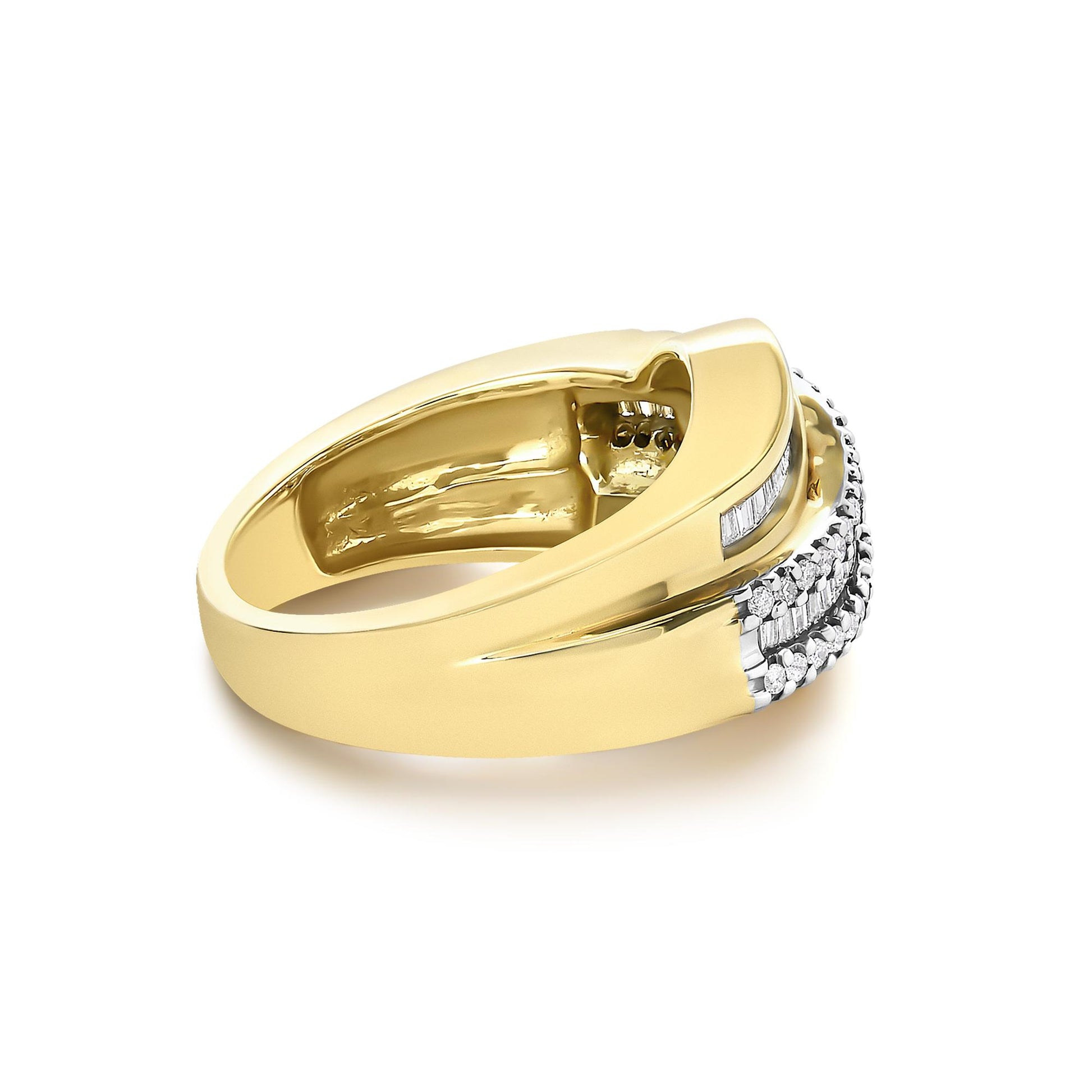 Close-up angled view of a yellow metal ring featuring two rows of white gemstones; one row with round gemstones in prong settings and the other with baguette gemstones in channel settings.