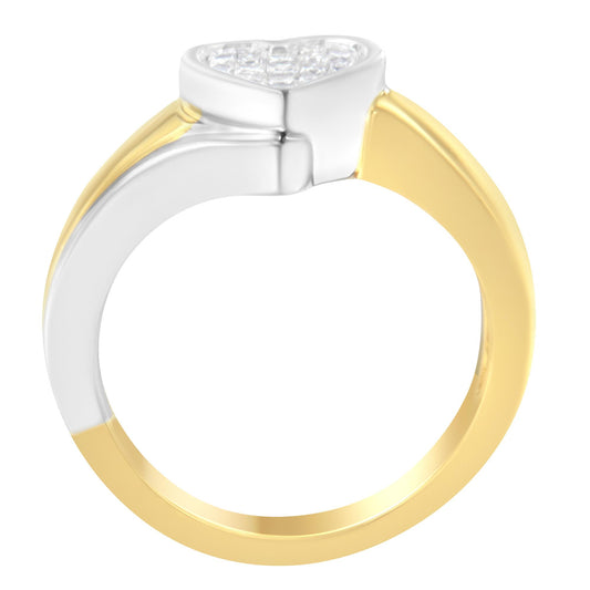 Side view of a two-tone ring with yellow and white metal, featuring a channel setting of white princess-shaped gemstones on top.