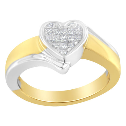 Ring with yellow and white metal band featuring a heart-shaped top set with channel-set white princess-shaped gemstones, shown at a slight angled top-down view.