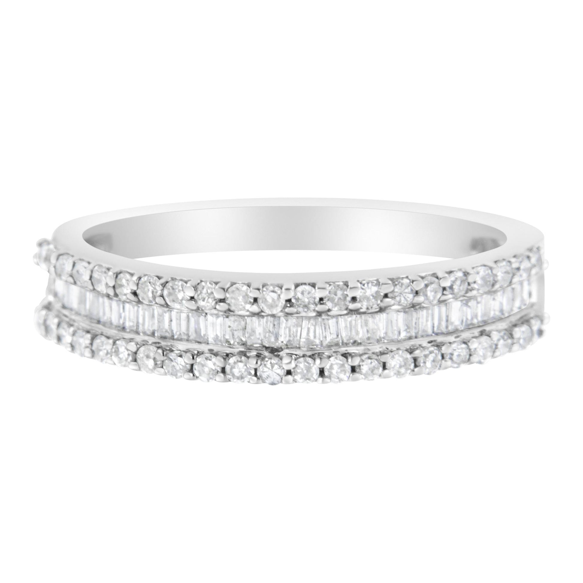 Front view of a white metal ring featuring two rows of round white gemstones in prong settings and one center row of baguette white gemstones in a channel setting.