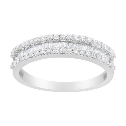 Close-up front angled view of a white ring with two rows of round white gemstones in prong settings and a center row of baguette-shaped white gemstones in channel settings.