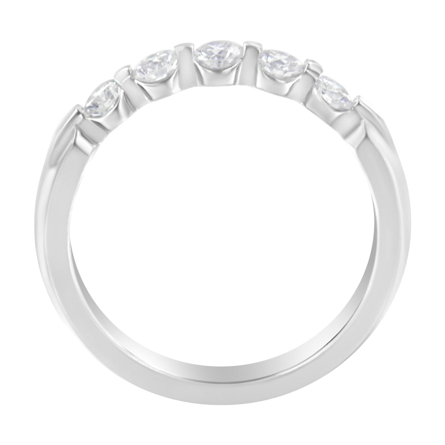 Top view of a white ring with five round white gemstones set in a channel setting.