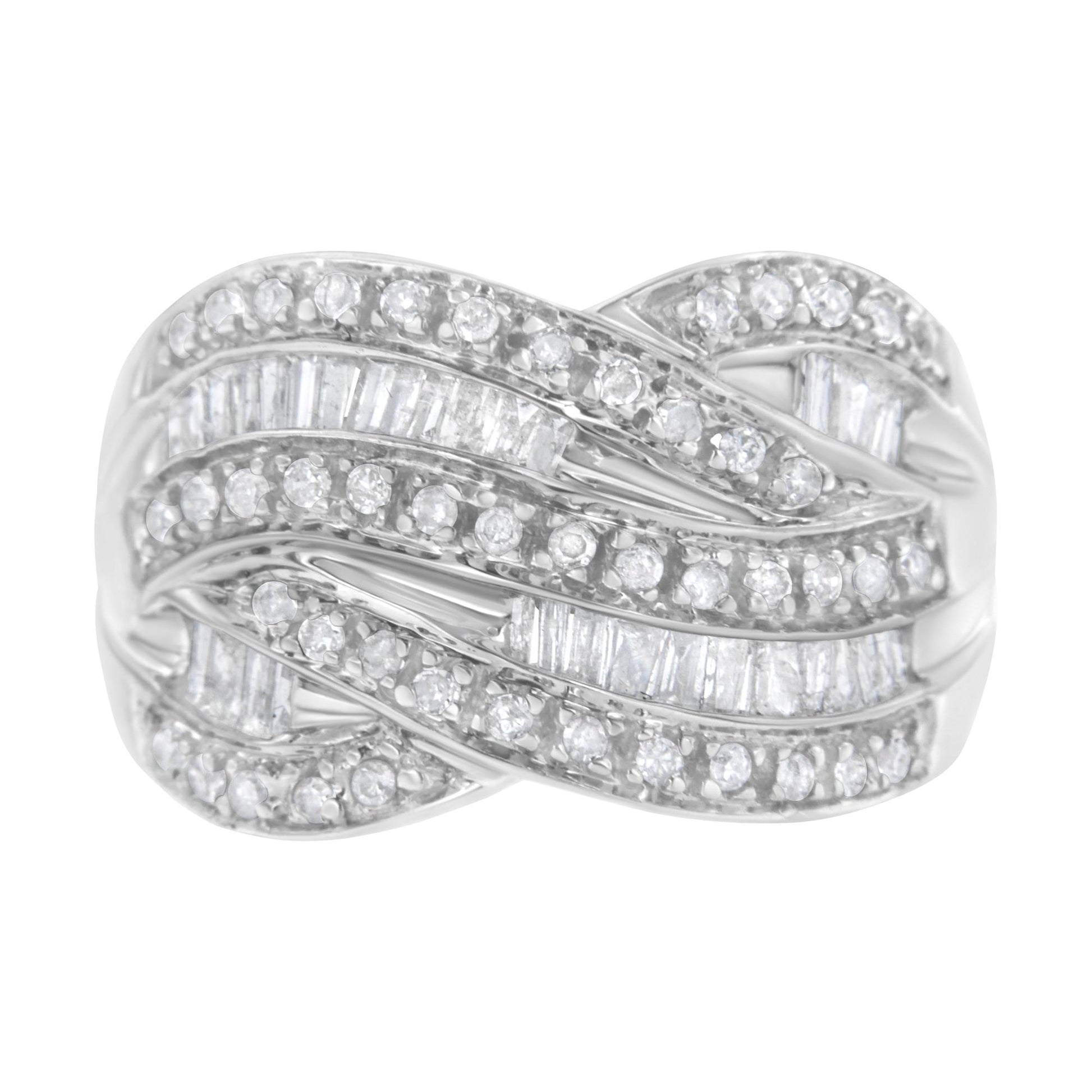 Top front angle of a white metal ring featuring intertwined bands set with round prong-set white gemstones and baguette channel-set white gemstones.
