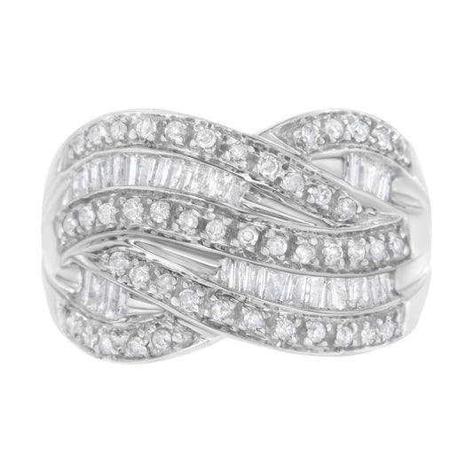 Top front angle of a white metal ring featuring intertwined bands set with round prong-set white gemstones and baguette channel-set white gemstones.