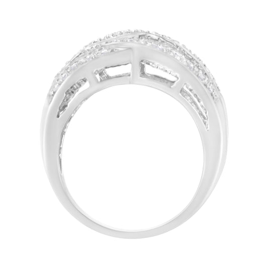 White metal ring viewed from the side, featuring rows of round prong-set white gemstones and baguette channel-set white gemstones.