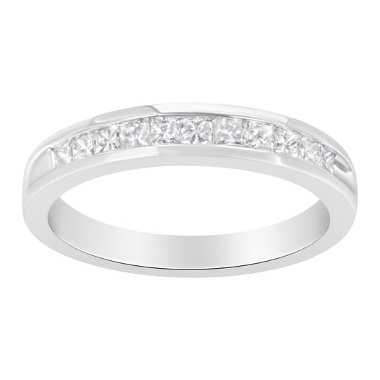 White metal ring with channel-set princess-cut white gemstones, shown from a slightly angled top view.