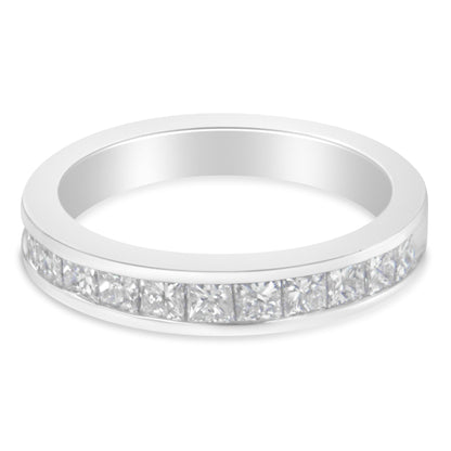Close-up angled view of a white metal ring with a channel setting featuring a row of square white gemstones.
