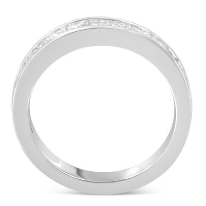 Top view of a white metal ring with a channel setting of princess-shaped white gemstones encircling the band.