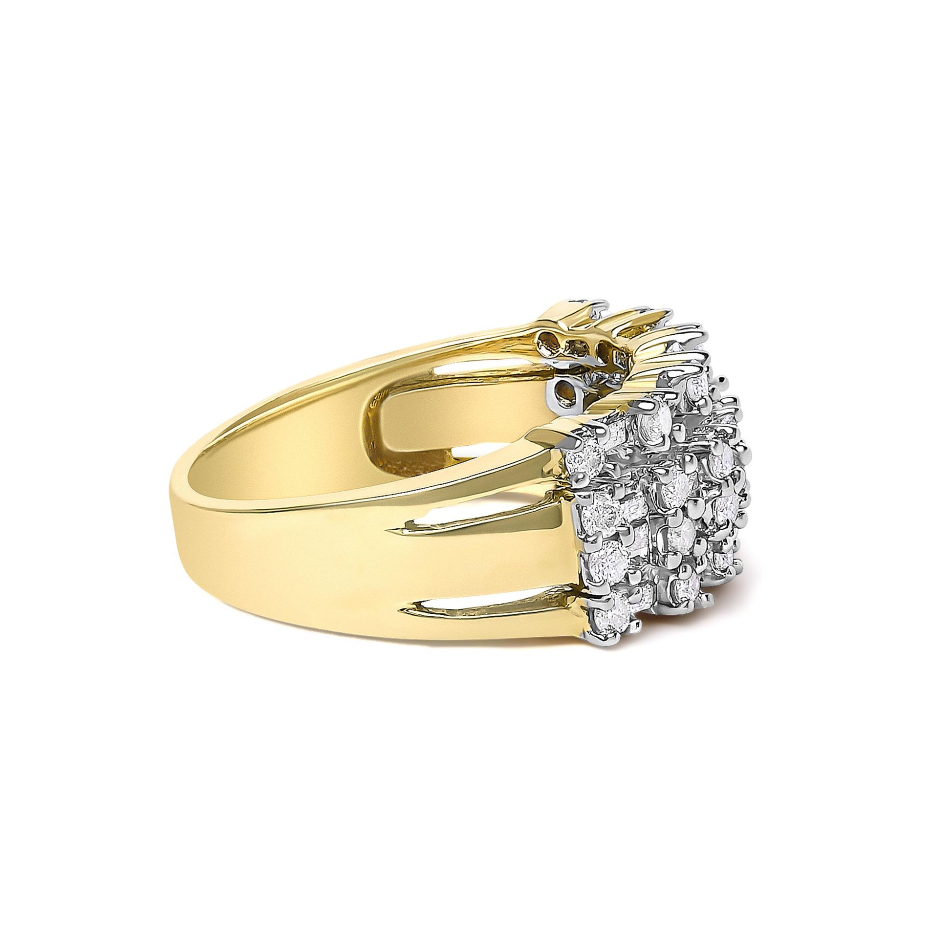 Yellow metal ring with a square cluster of white round prong-set gemstones surrounded by channel-set white baguette gemstones, shown at a side angle.