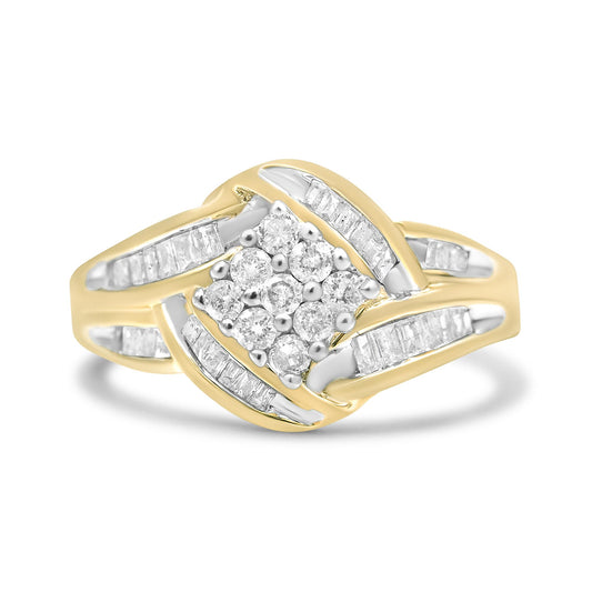 Close-up front angle of a yellow and white metal ring featuring a cluster of round prong-set white gemstones in the center, surrounded by rows of channel-set baguette white gemstones.