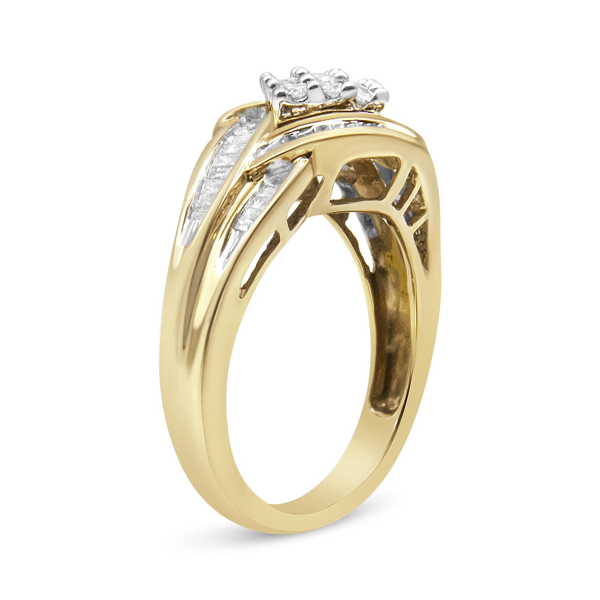 Angle side view of a yellow and white metal ring featuring white round gemstones in prong settings and white baguette gemstones in channel settings.