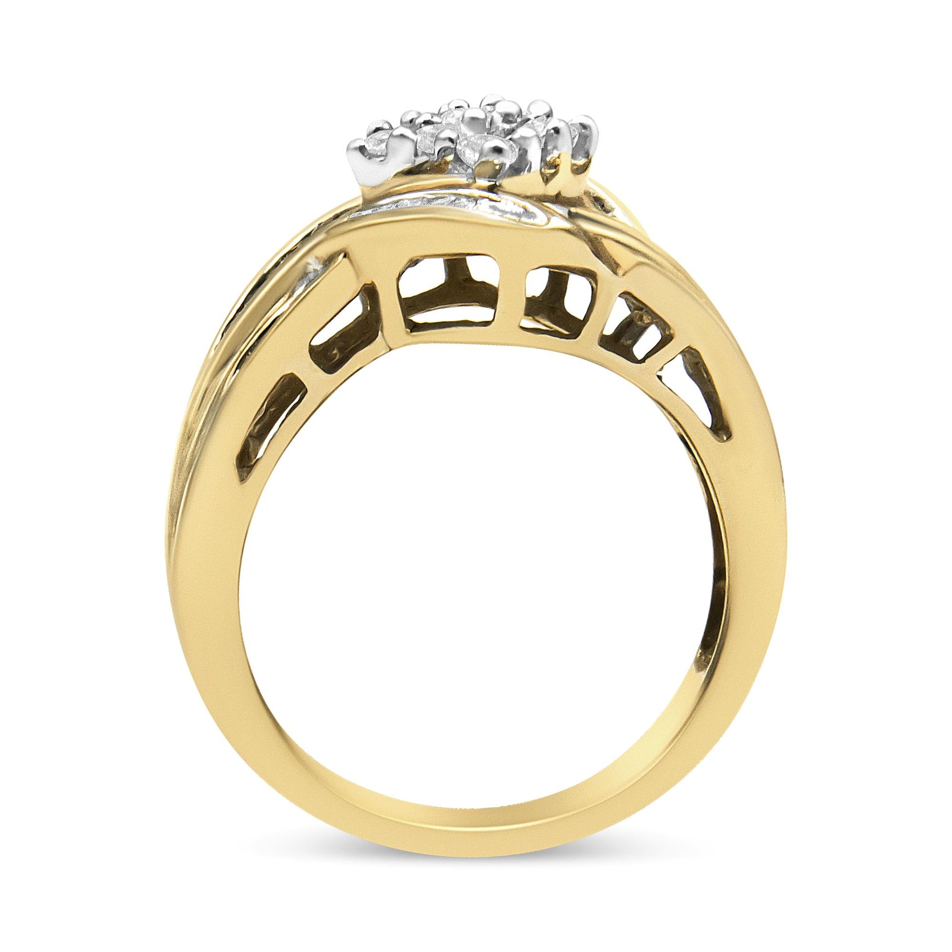 Front angle view of a two-tone ring with a yellow band and white setting, featuring round white gemstones in prong settings and baguette white gemstones in channel settings.