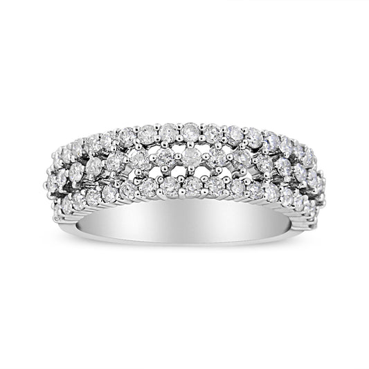 Front angled view of a white metal ring with three rows of round white gemstones in prong settings.