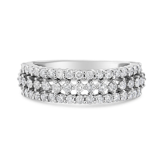 Close-up front view of a white metal ring featuring three rows of round white gemstones in prong settings.