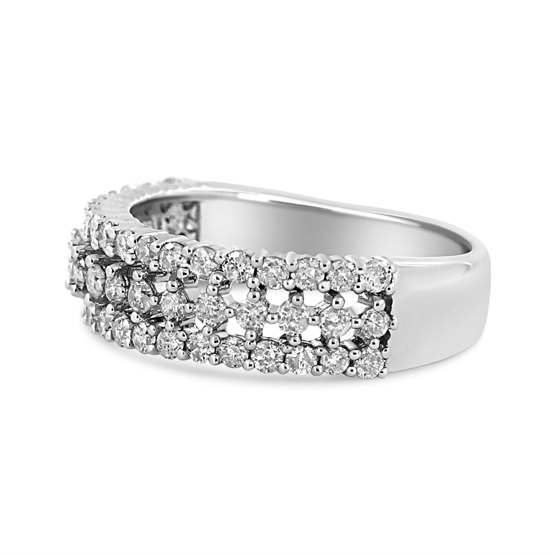 White metal ring with two rows of prong-set round white gemstones, shown at a slight side angle.