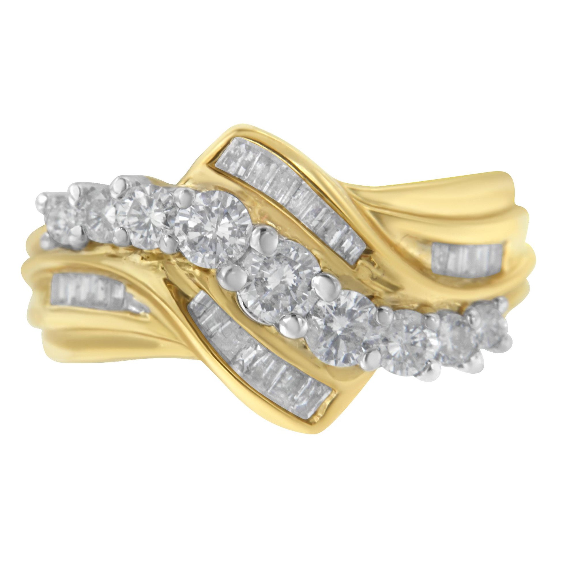 Close-up front angle of a yellow and white metal ring featuring a row of round white gemstones in prong settings across the center, surrounded by multiple baguette white gemstones in channel settings on the curved band.