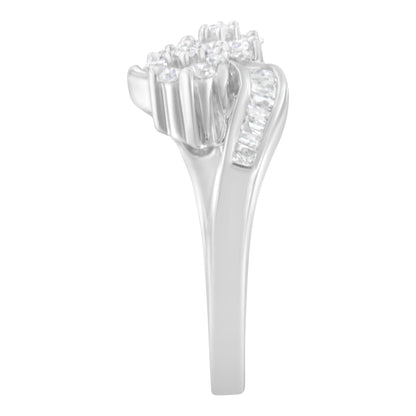 Side view of a white ring featuring round prong-set white gemstones clustered at the top and channel-set baguette white gemstones along the shoulders.