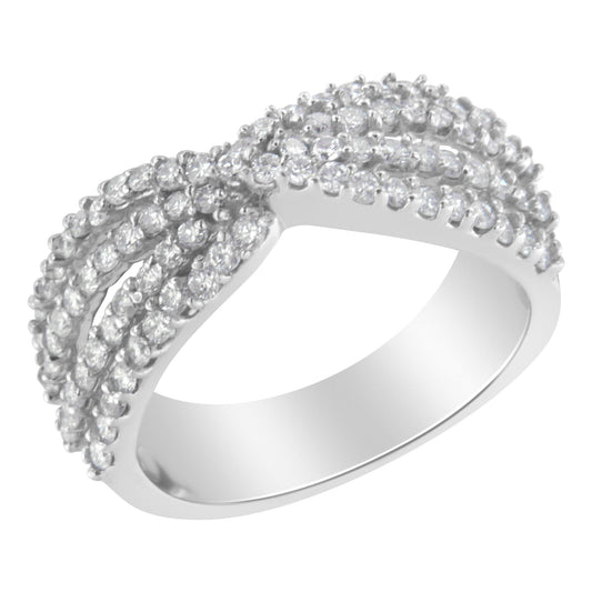 White metal ring with multiple rows of round white gemstones in prong settings, shown at a slight angle.