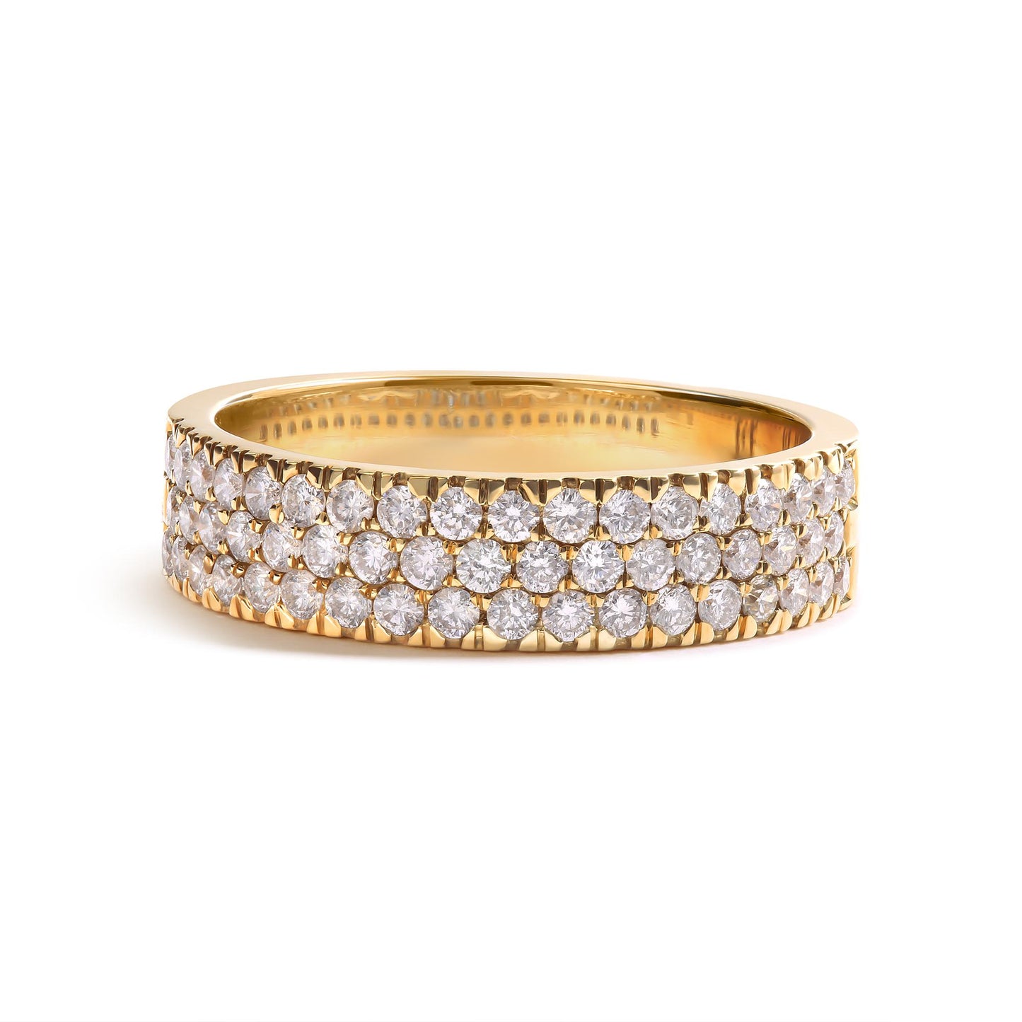 Yellow metal ring with three rows of round white gemstones in pave setting, shown in close-up side angle.