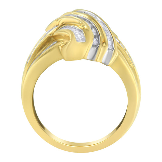 Yellow metal ring with channel-set white round and baguette gemstones, shown in a front close-up angle.
