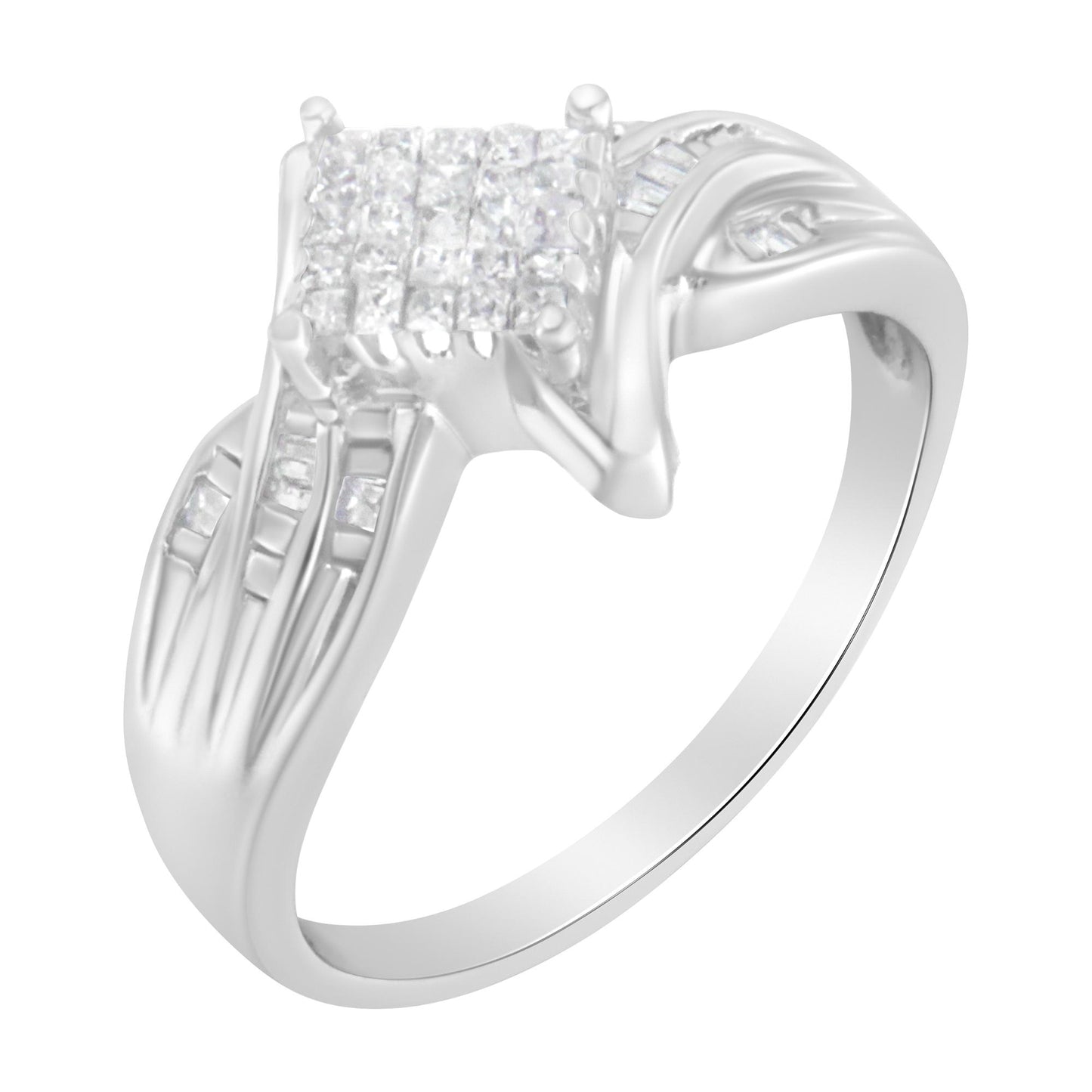 White metal ring shown in a three-quarter angle with a square cluster of small white gemstones in the center, accented by baguette-shaped white gemstones in channel settings on the shoulders and princess-shaped white gemstones in invisible settings around the central cluster.
