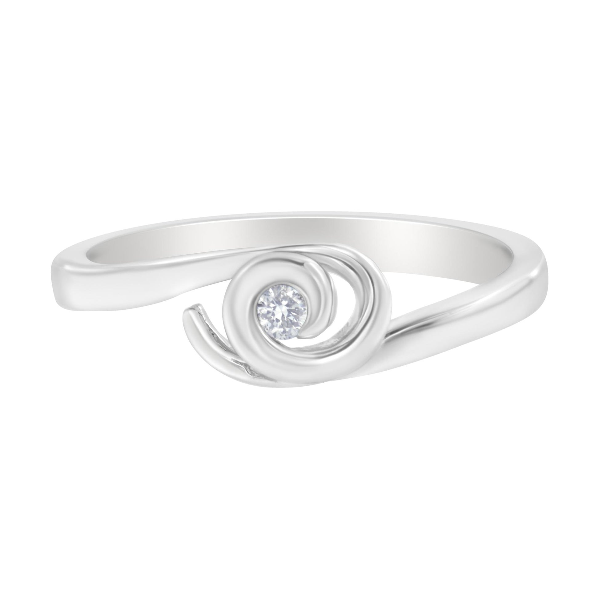White metal ring with a round white gemstone in a bezel setting, viewed from a side angle.