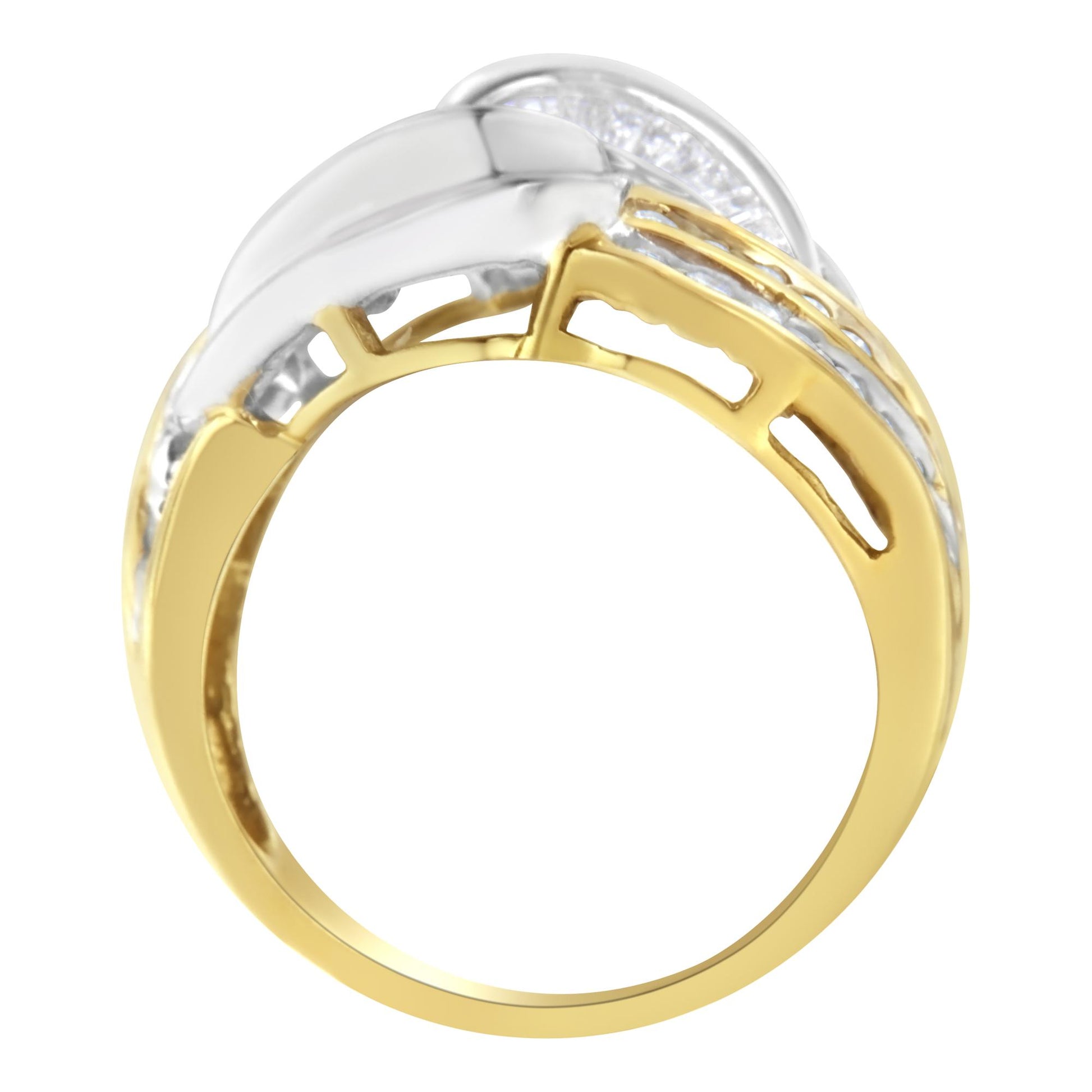 Close-up side view of a two-tone ring with yellow and white metal featuring channel-set round and baguette white gemstones.